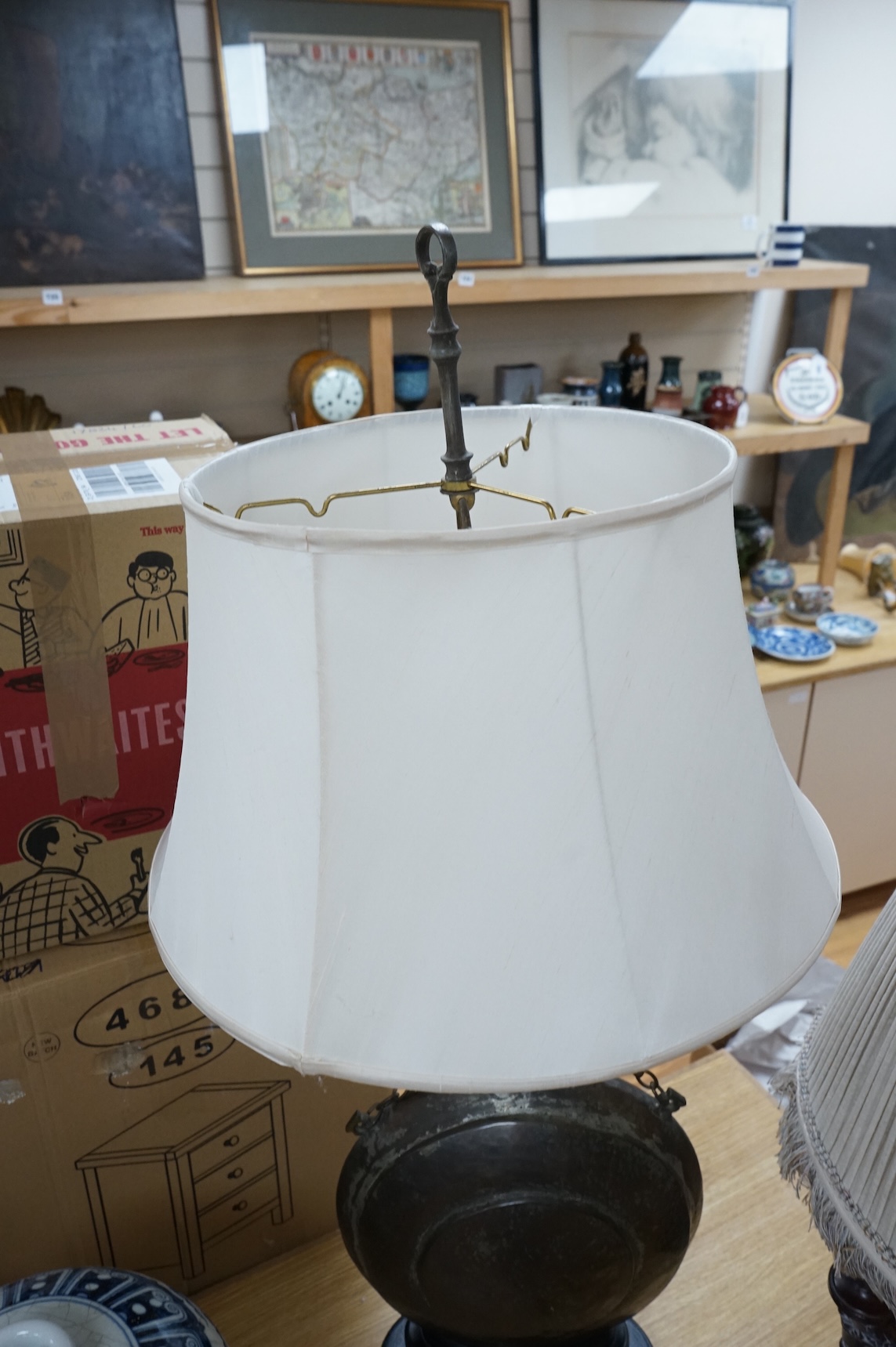 A Frederick Cooper Bouillotte lamp, together with a hammered metal table lamp, formed from a water flask (2)